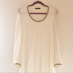 Long sleeved cream shift dress